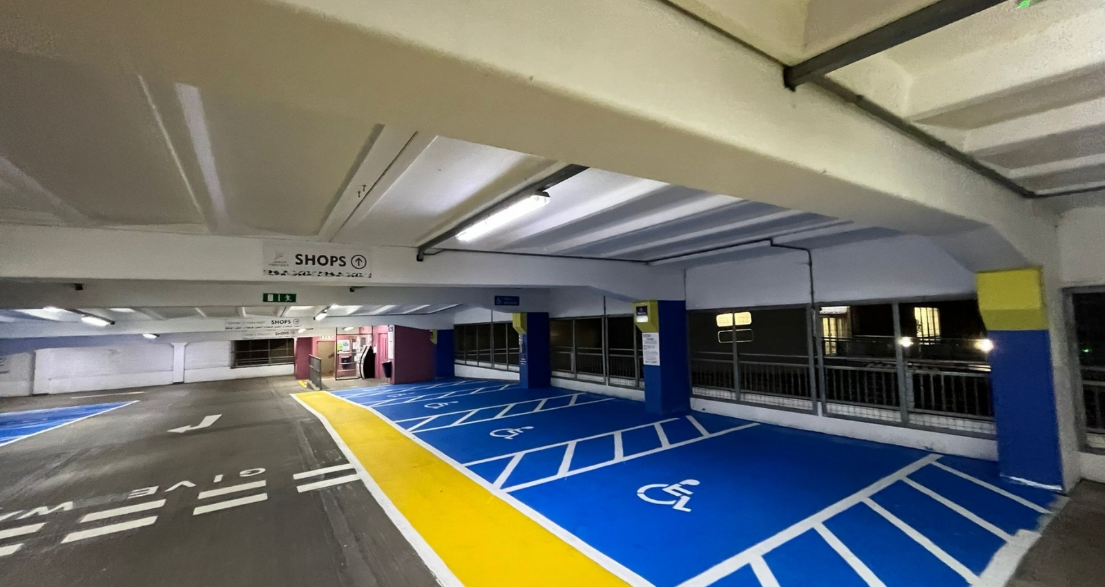 Disabled parking bay with high-visibility thermoplastic markings